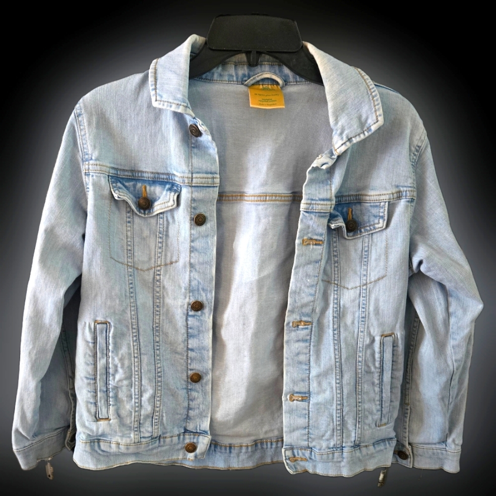 Girls size 10-12 plus husky. Vintage light wash denim jacket